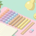Pastel desk scene with small colored cubes, long rods, a grid notebook and a pencil cup on a mint background.