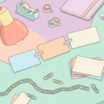 Pastel desk scene with linked paper clips, blank cards joined by strips, a ruler and a pencil jar on mint green.